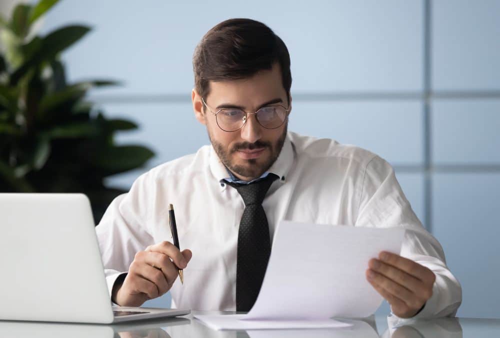 Business Owner Reviewing The Members Voluntary Process Liquidation